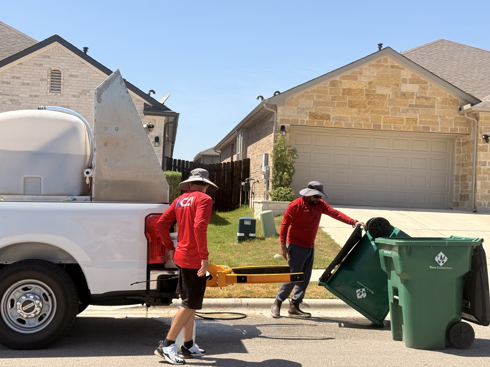 Keep Bin Clean truck and crew serving Silvia Maa's trash bins